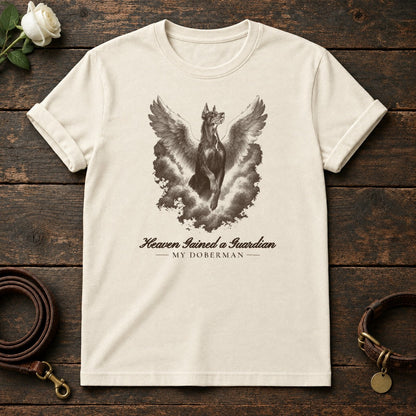 Heaven Gained a Guardian – Winged Doberman Memorial Tee in Natural