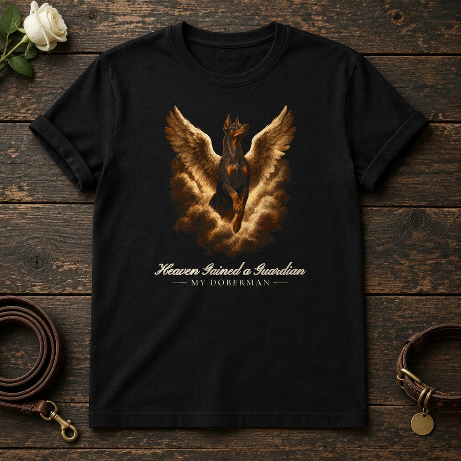 Heaven Gained a Guardian – Winged Doberman Memorial Tee in Black